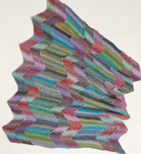 Load image into Gallery viewer, Multicoloured zigzag patterned knitted blanket on a white background