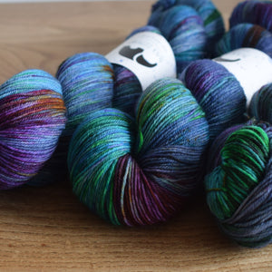 Black Elephant brand hand dyed sock yarn, colours blueand green