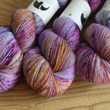 Load image into Gallery viewer, Black Elephant hand dyed sock yarn, shades of pink 