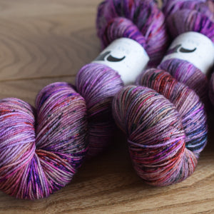Black Elephant brand hand dyed sock yarn, shades of dark pink