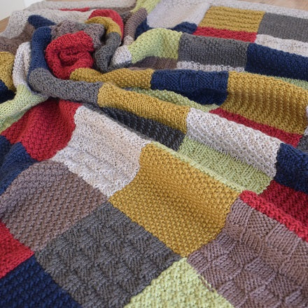 Knitted patchwork blanket pattern